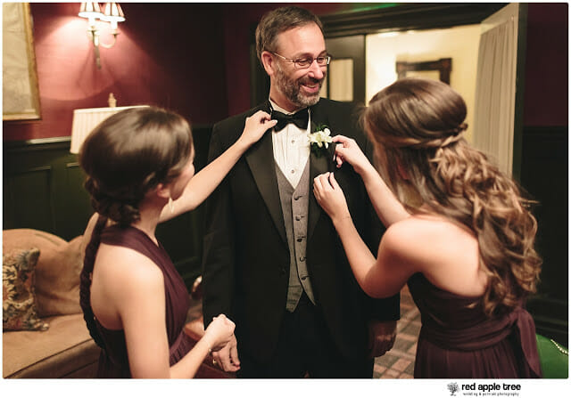 Al and daughters fixing Wedding suit