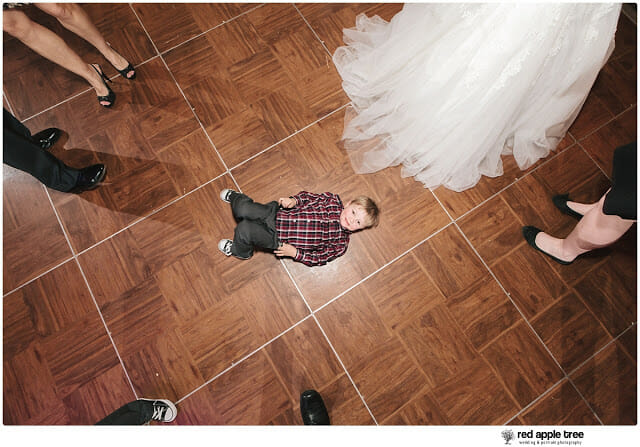 Wedding Dress and boy on floor
